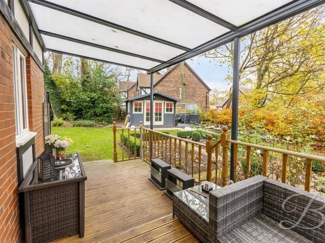 Here is another of the outdoor seating areas - a covered balcony-type space that could be enjoyed most times of the year.