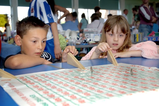 The school summer fair in 2005. Is there someone you know in this photo?