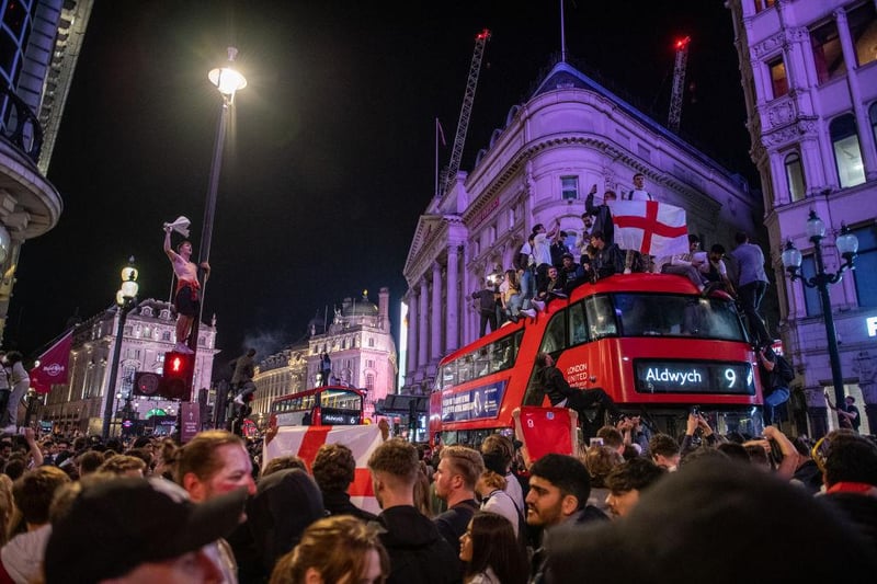 There were scenes of celebration all across the country on Wednesday night, but none were quite as striking as the outpouring of joy seen in the capital as the centre of London erupted into a carnival-like atmosphere. 

(Photo by Chris J Ratcliffe/Getty Images)