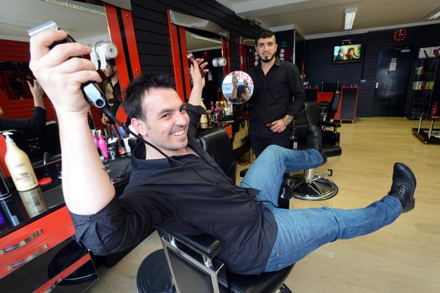 Turkish barber Selcuk Isli with Ali Arslan in his new shop on Derwent Street, Sunderland in 2014.