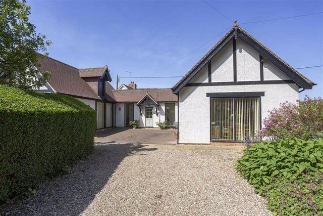 The property provides a number of outbuildings, including a detached two storey cottage and a converted coach house.