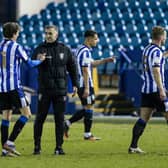 Sheffield Wednesday caretaker manager Neil Thompson celebrates with Adam Reach after a 1-0 win over Derby County.
