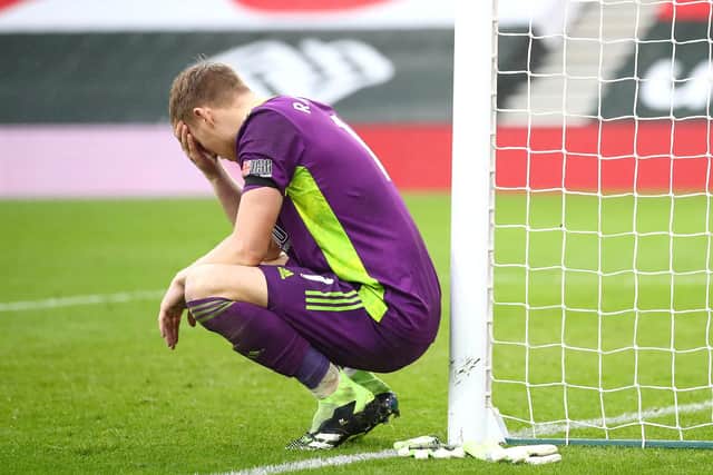 Sheffield United goalkeeper Aaron Ramsdale appears dejected after the final whistle during the Premier League match at St Mary's Stadium. Michael Steele/PA Wire.
