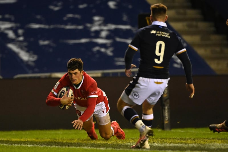 Louis Rees-Zammit of Wales touches down for his team's firstock try during the Guinness Six Nations match between Scotland and Wales at Murrayfield