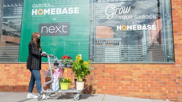 Shoppers at new Homebase section at Next, Camberley, Surrey (Homebase/PA)