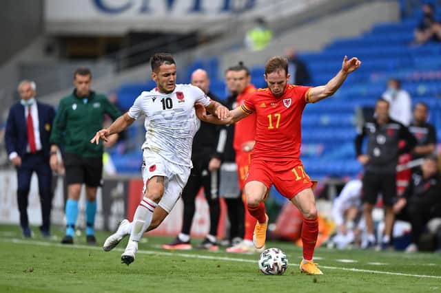 Rey Manaj of Albania and Rhys Norrington-Davies of Wales battle for the ball (Justin Setterfield/Getty Images)