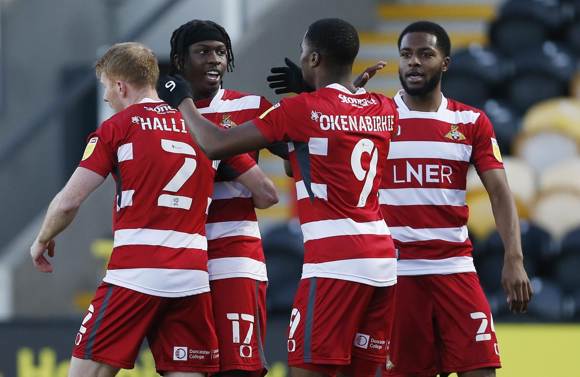 Fejiri Okenabirhie is congratulated after giving Rovers the lead against Burton Albion. Picture: Craig Brough/AHPIX