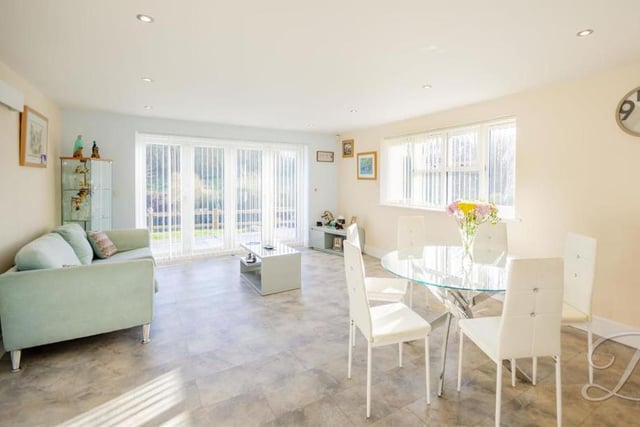 As part of the open-plan heart of the house, the kitchen extends into this lovely, bright dining area. There is room for a dining table and sofa, making it perfect for entertaining family and friends.