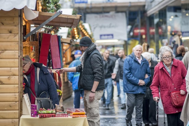 Shoppers at Sheffield Christmas Market on Fargate in 2017