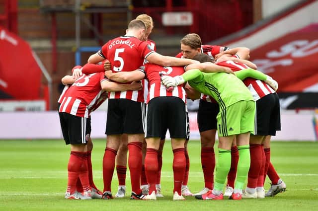 Players of Sheffield United huddle prior to the Premier League match between Sheffield United and Chelsea FC at Bramall Lane on July 11, 2020 in Sheffield. (Photo by Rui Vieira/Pool via Getty Images)