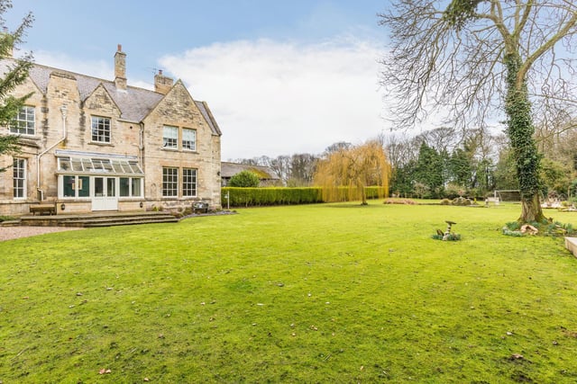 The property stands in beautifully manicured grounds extending in excess of 1.5 acres. The walled gardens and mature trees and shrubs provide total seclusion and privacy.