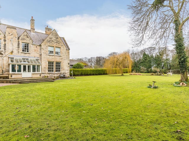 The property stands in beautifully manicured grounds extending in excess of 1.5 acres. The walled gardens and mature trees and shrubs provide total seclusion and privacy.