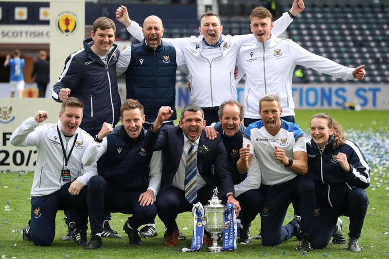 St Johnstone manager Callum Davidson and staff celebrate with the trophy after the final