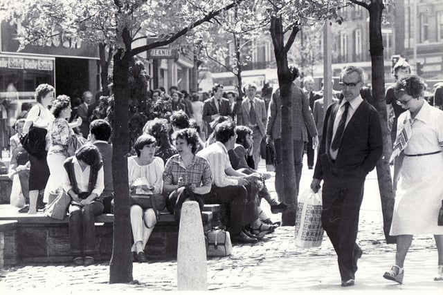 More Sheffield shoppers enjoy their day in the sun in the city centre in 1981.