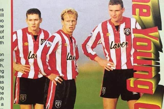 Lee, centre, pictured in a matchday programme during his time as a Blade.