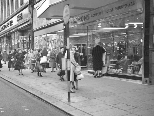 Shoppers in Fawcett Street in December 1960. Does this bring back happy memories?