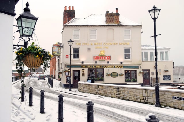 A closer look at our headline image. The Still and West pub, in Old Portsmouth, gets a gorgeous dusting of snow. Picture: Malcolm Wells (13153-5262)