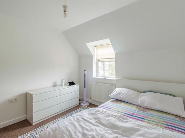 Bedroom 1 - A double room with a front facing double glazed window and a central heating radiator. There is access to the en-suite shower room.