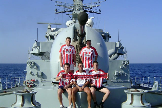 Five Sheffield United fans who are serving aboard HMS ST ALBANS.