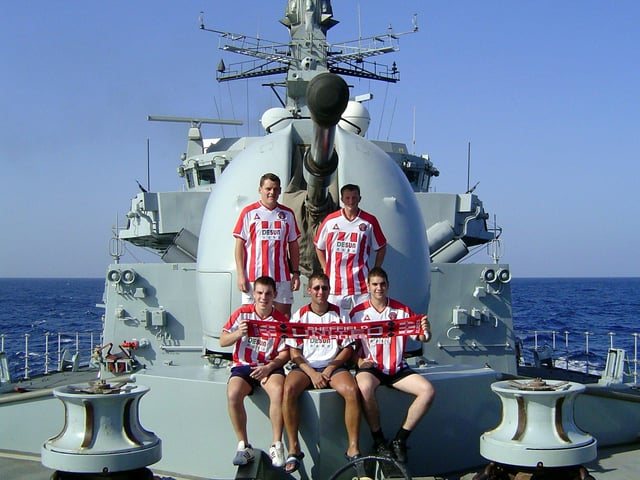 Five Sheffield United fans who are serving aboard HMS ST ALBANS.