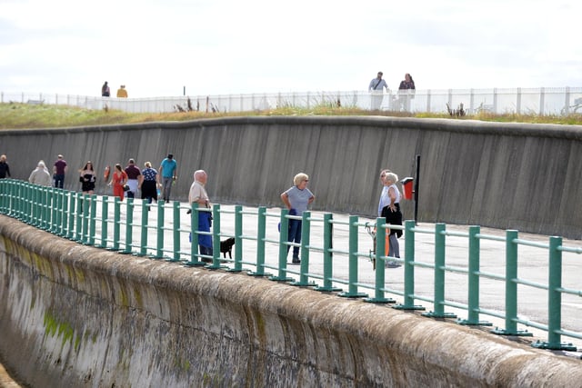 People making the most of the dry weather on Monday, August 24, with a walk along Seaburn seafront.