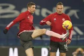 Chris Basham and Phil Jagielka of Sheffield Utd warm up: Andrew Yates/Sportimage