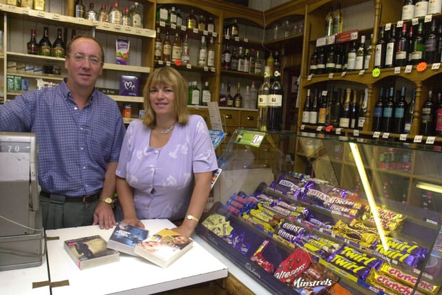 Peter and Sue Petryshn  who are left their corner shop Greystones Wines on Greystones Road in 2002