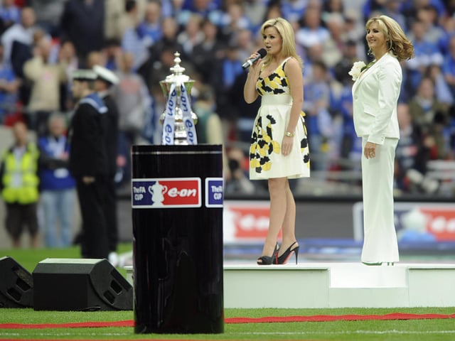 Lesley Garrett (right) and Katherine Jenkins sing the national anthems prior to kick off.