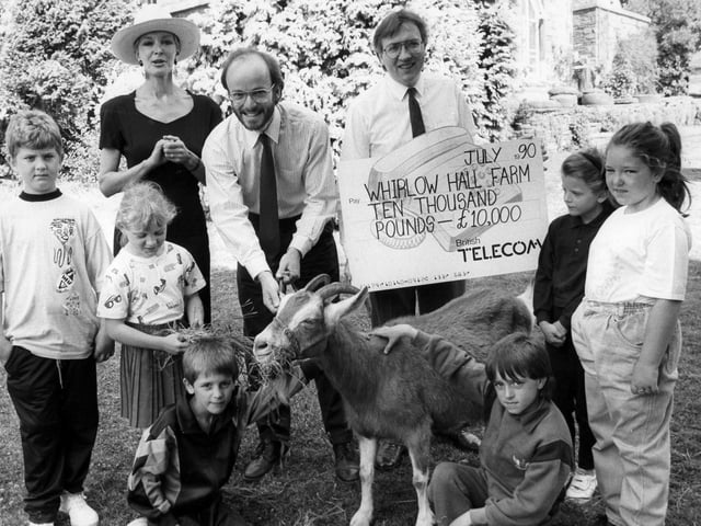 Marti Caine presents a cheque for £10,000 donated by British Telecom to the Whirlow Hall Farm Trust to help the farm's £80,000 appeal launched earlier this year, July 18, 1990