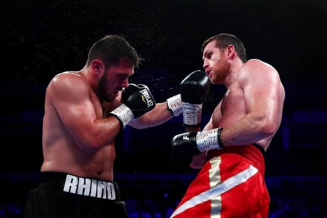 Dave Allen battles with David Price during a punishing WBA continental heavyweight title fight last
