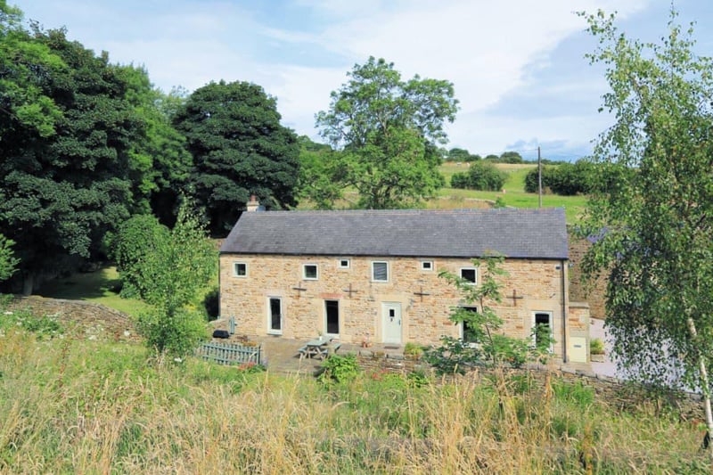 West Barn, at Holymoorside close to the Peak District boundary, sleeps eight and is set in undisturbed surroundings right by a stream. "This quaint barn conversion oozes character and charm," its description states. (https://www.cottages.com/cottages/west-barn-rddv)