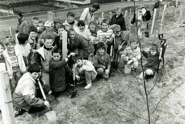 Youngsters from Stocksbridge played their part in preserving woodland by planting trees to start a forest April 1990