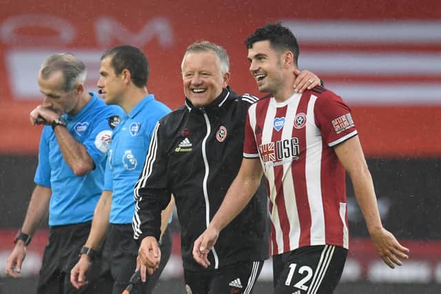 Sheffield United manager Chris Wilder celebrates with match winner John Egan after his injury-time goal helped secure a 1-0 win over Wolverhampton Wanderers at Bramall Lane this evening. (Photo by Peter Powell/Pool via Getty Images)