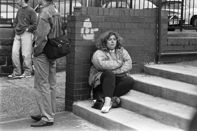 A despondent Donna Rodgers, one of the  hundreds of angry Hibs fans who turned up at Easter Road football stadium after hearing Hearts chairman Wallace Mercer's plans.