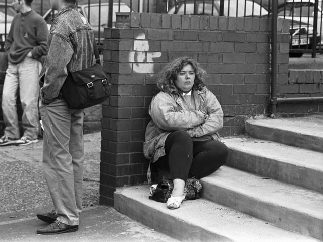 A despondent Donna Rodgers, one of the hundreds of angry Hibs fans who turned up at Easter Road football stadium after hearing Hearts chairman Wallace Mercer's plans.