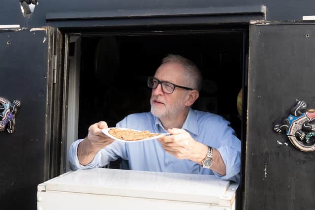 Former Labour Party leader Jeremy Corbyn serving oatcakes during a visit to The Oatcake Boat owned by Kay Mundy in Stoke-on-Trent while on the General Election campaign trail in 2019