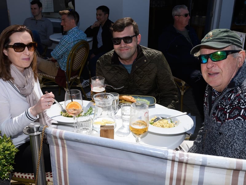 Pictured is: Esta and Gareth Burrell, John WIngrove have a meal and drink outside the Abar Bistro, Old Portsmouth.
Picture: Keith Woodland (240421-24)