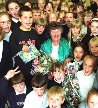 Pauline Buxton a well-loved teacher here photographed with students at Barnburgh Primary in 1997.