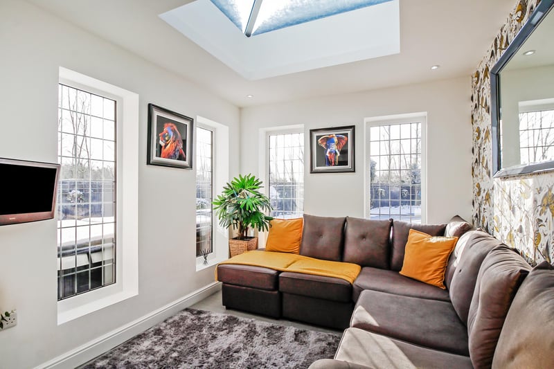 Attached to the kitchen is a beautiful sun room/family room with a roof light and views overlooking the rear garden.