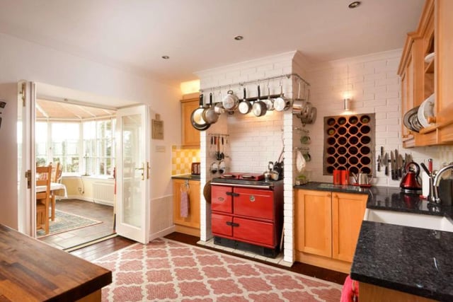 The kitchen boasts an oil fired Stanley range cooker and a north facing utility room as well