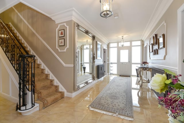 This huge five-bedroom Portsdown Hill home in Portsmouth is up for raffle. Pictured is its 6.4m x 2.44m hallway.
