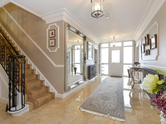This huge five-bedroom Portsdown Hill home in Portsmouth is up for raffle. Pictured is its 6.4m x 2.44m hallway.