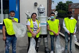 Phil the Bin with volunteers on a litter pick