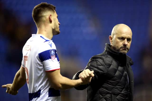 Reading manager Mark Bowen (right) and Matt Miazga appear dejected after losing to the Blades: Nick Potts/PA Wire