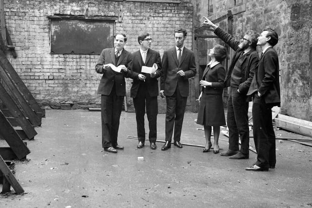 The Traverse Theatre, now on Cambridge Street, began life in St James Close on the Royal Mile. Members of the Traverse Theatre Club are pictured checking out the renovation work to create the theatre before it opened in 1963.