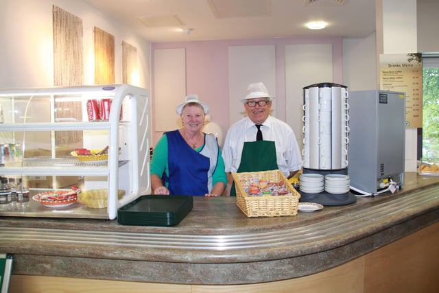 A dedicated group of volunteers from the Alzheimer’s Society running a café at The Woodlands, a newly-opened inpatient unit run by Rotherham Doncaster and South Humber NHS Foundation Trust (RDaSH) in Rotherham for older people who have acute mental health problems. Pictured at the café in 2011 were volunteers Val Myers and John Whiting.