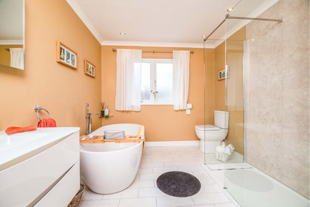 The family bathroom is complete with heated skirting and bluetooth connection.