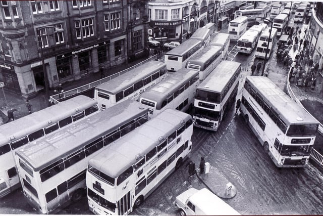 Disrupted time tables due to the bad winter weather caused buses lots of trouble, with High Street, Sheffield, badly hit as the buses arrived together - 21 January 1980
