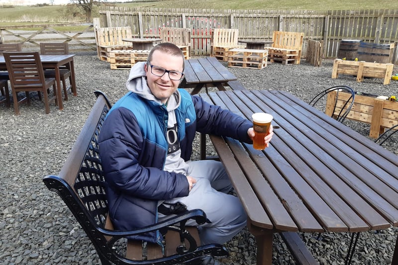 Frank Lyford enjoying a pint at Alnwick Brewery's outdoor space at Hawkshill Business Park.