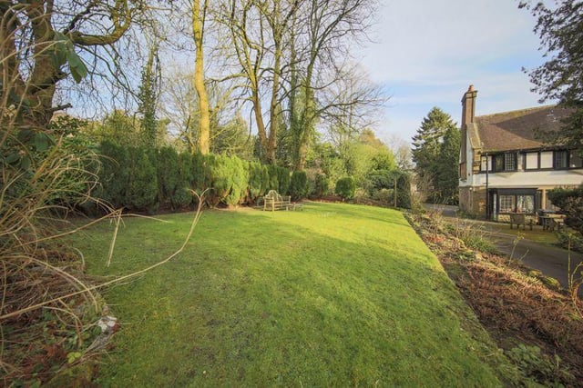 To the rear of the coach house is a pleasant woodland which then leads to the golf course.
